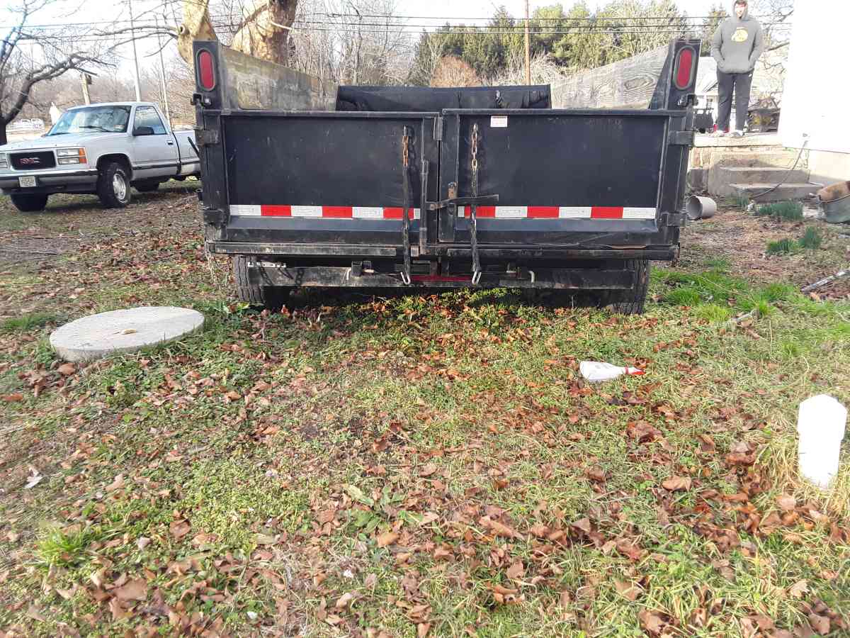 2018 sure track Dump  Trailer Tag along dual Rams  Alxes