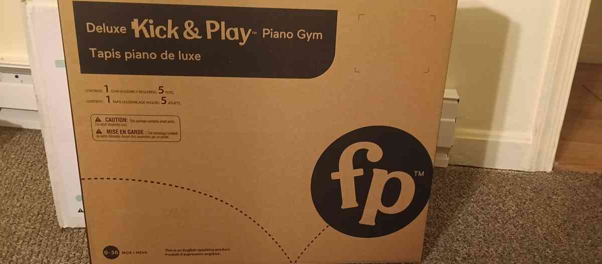 Fisher price kick and play piano gym