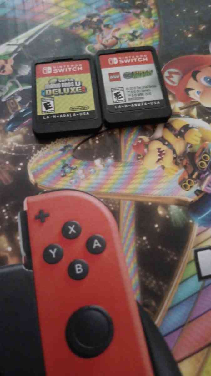 Nintendo  Swich whith blue and red joy con  Mariokart  Delux