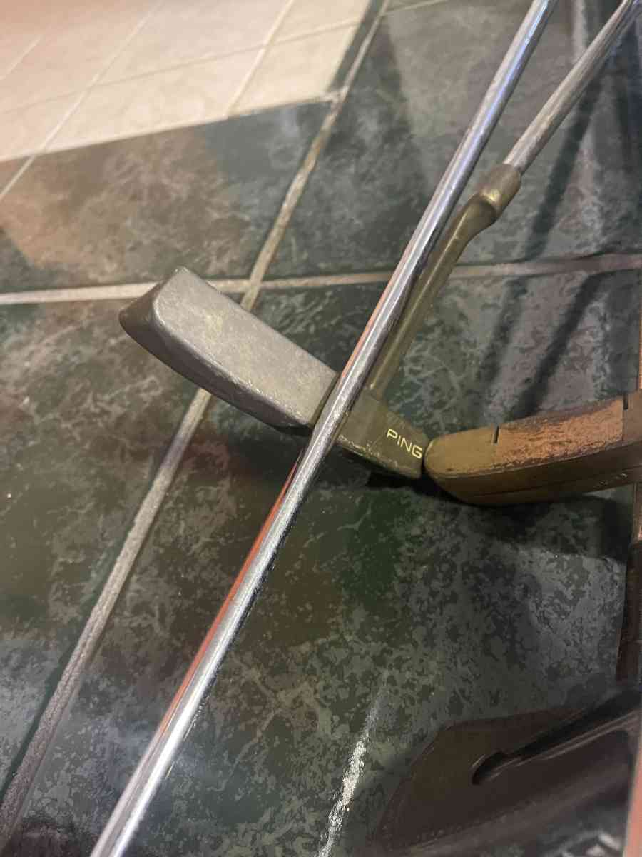 huge lot of golf clubs