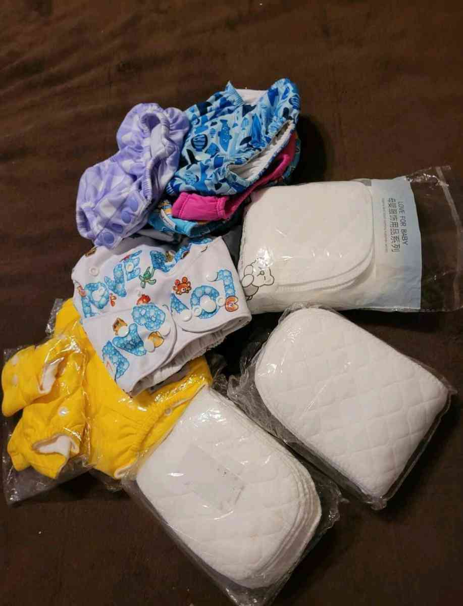 NEW 9 WASHABLE DIAPERS AND 30 PADS