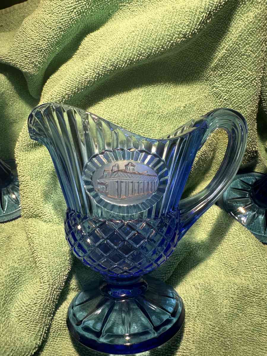 blue glass goblets and pitcher