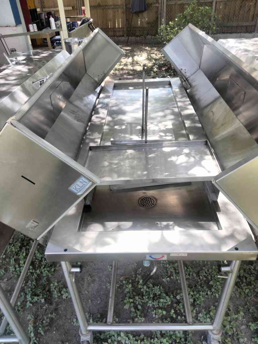 Autopsy exam tables