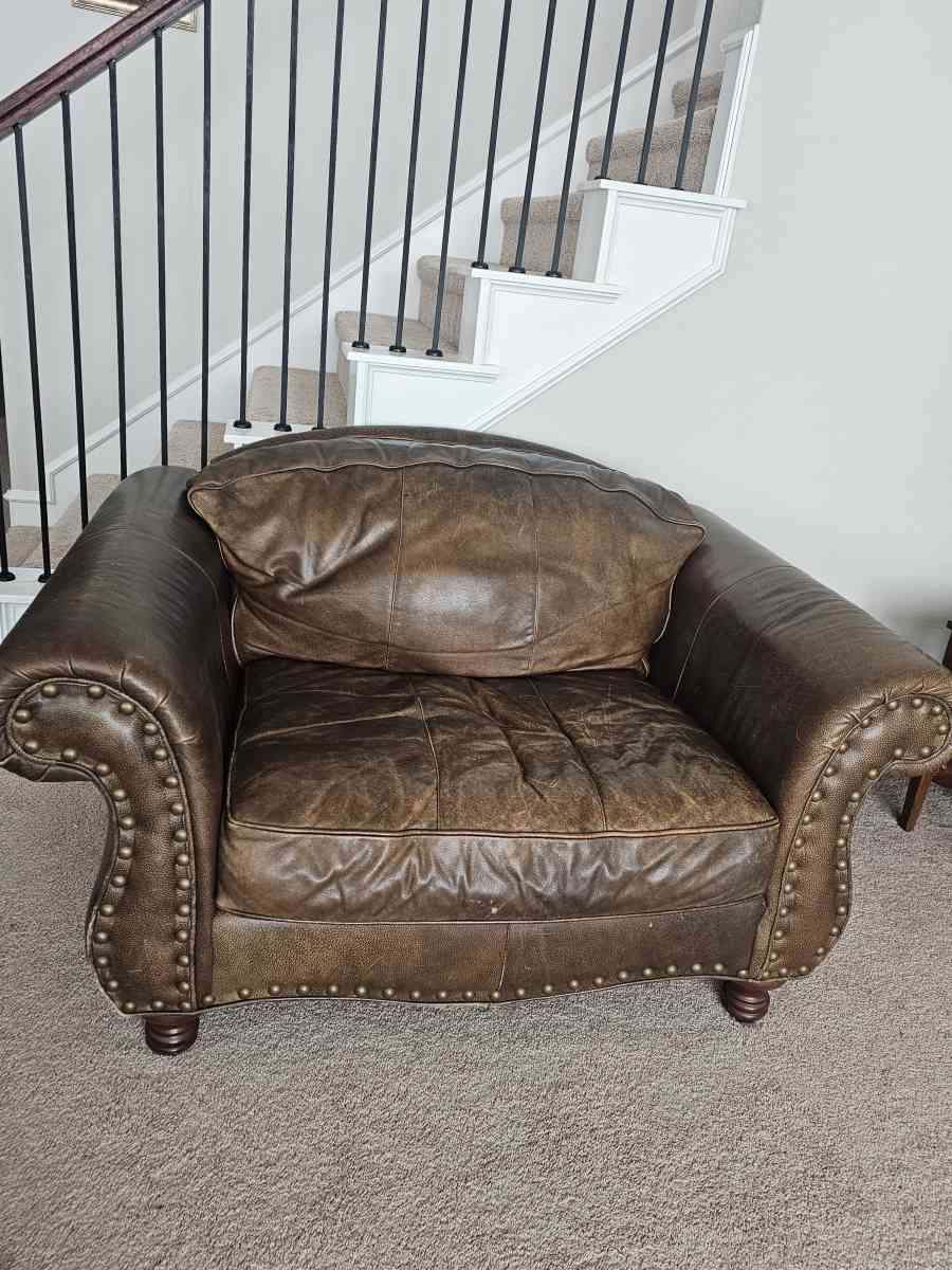 leather sofa with matching chair and ottoman