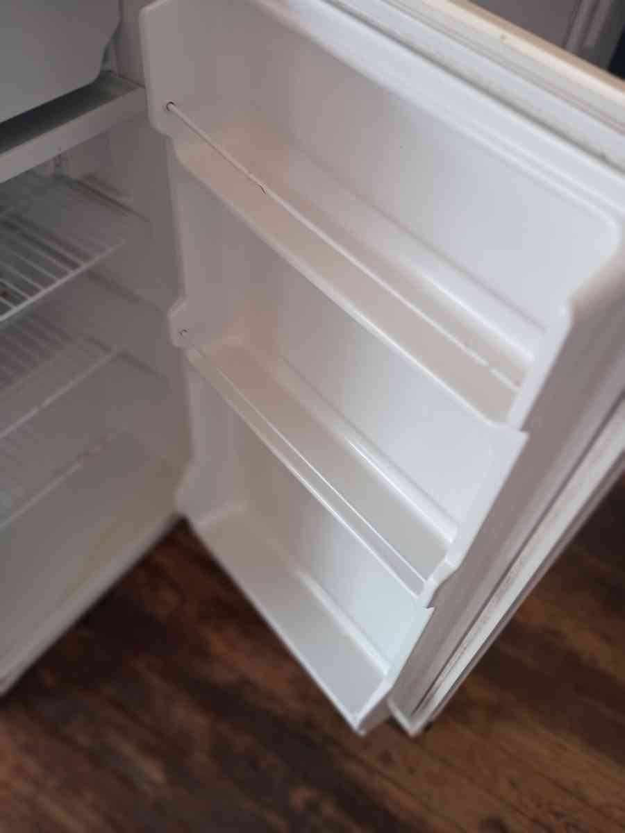 Kenmore mini fridge works fine needs a new hinge