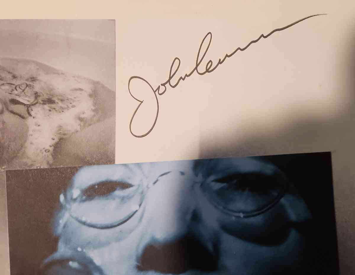 John Lennon Autograph on White album insert poster
