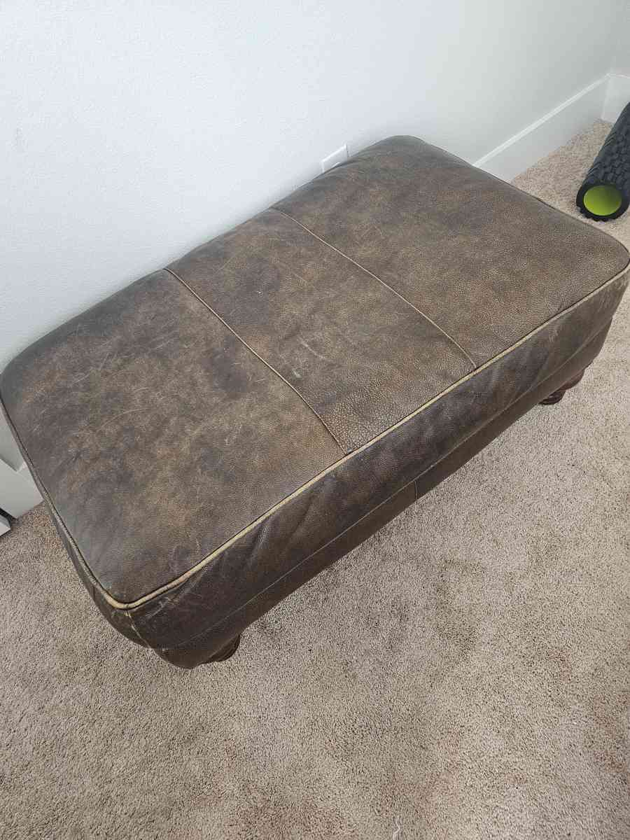 leather sofa with matching chair and ottoman