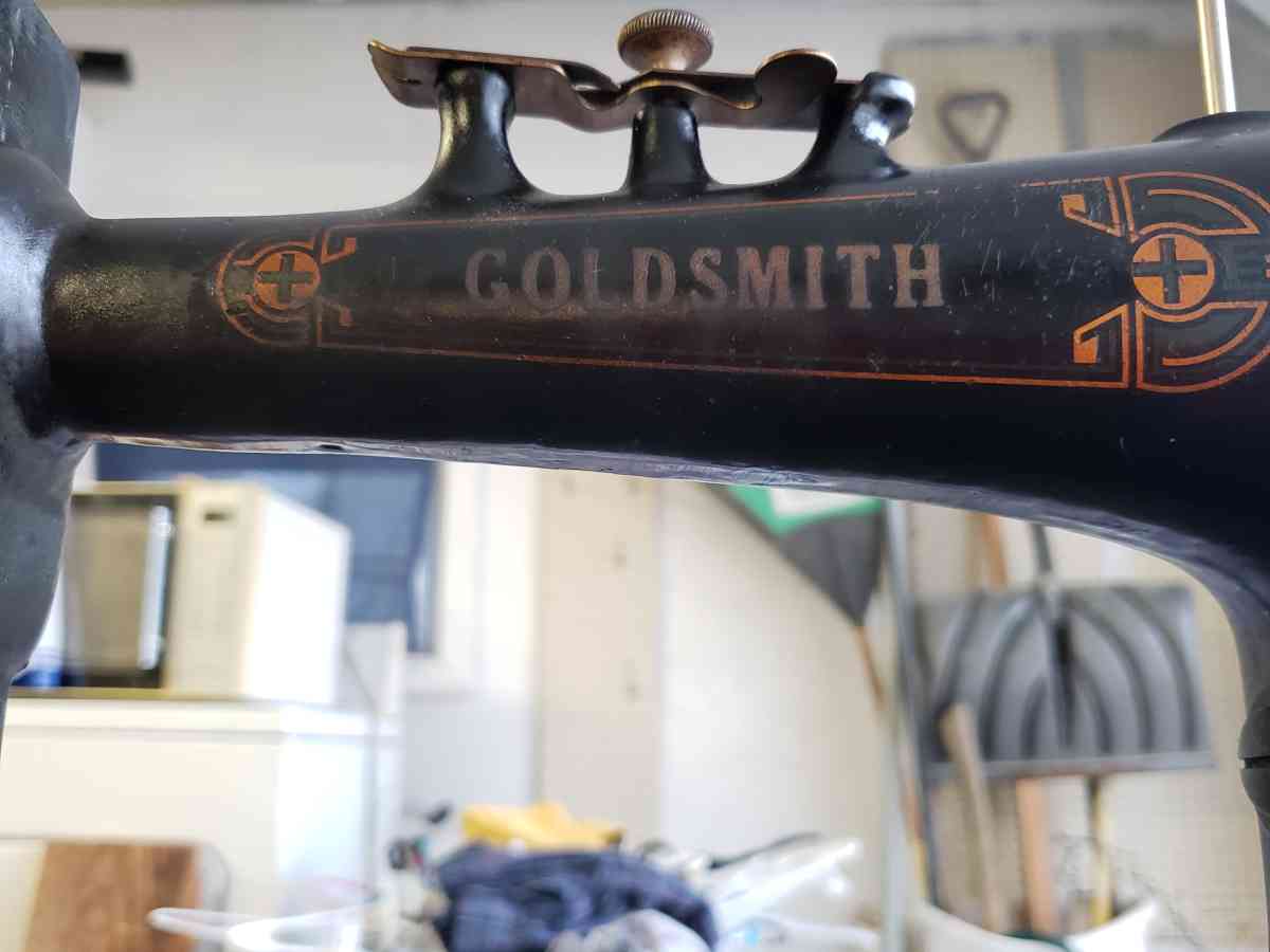 1907 Goldsmith sewing machine and table