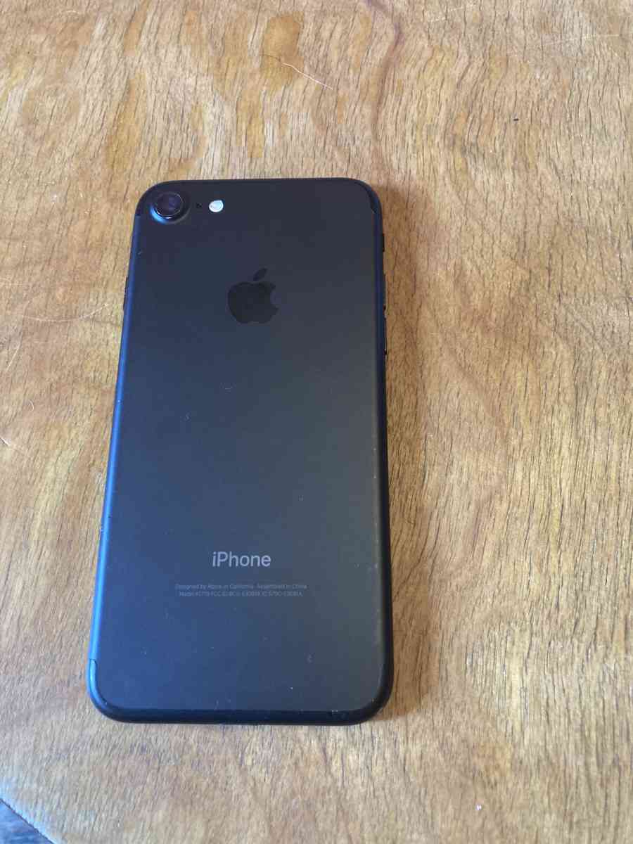 iPhone 7 with case and charger