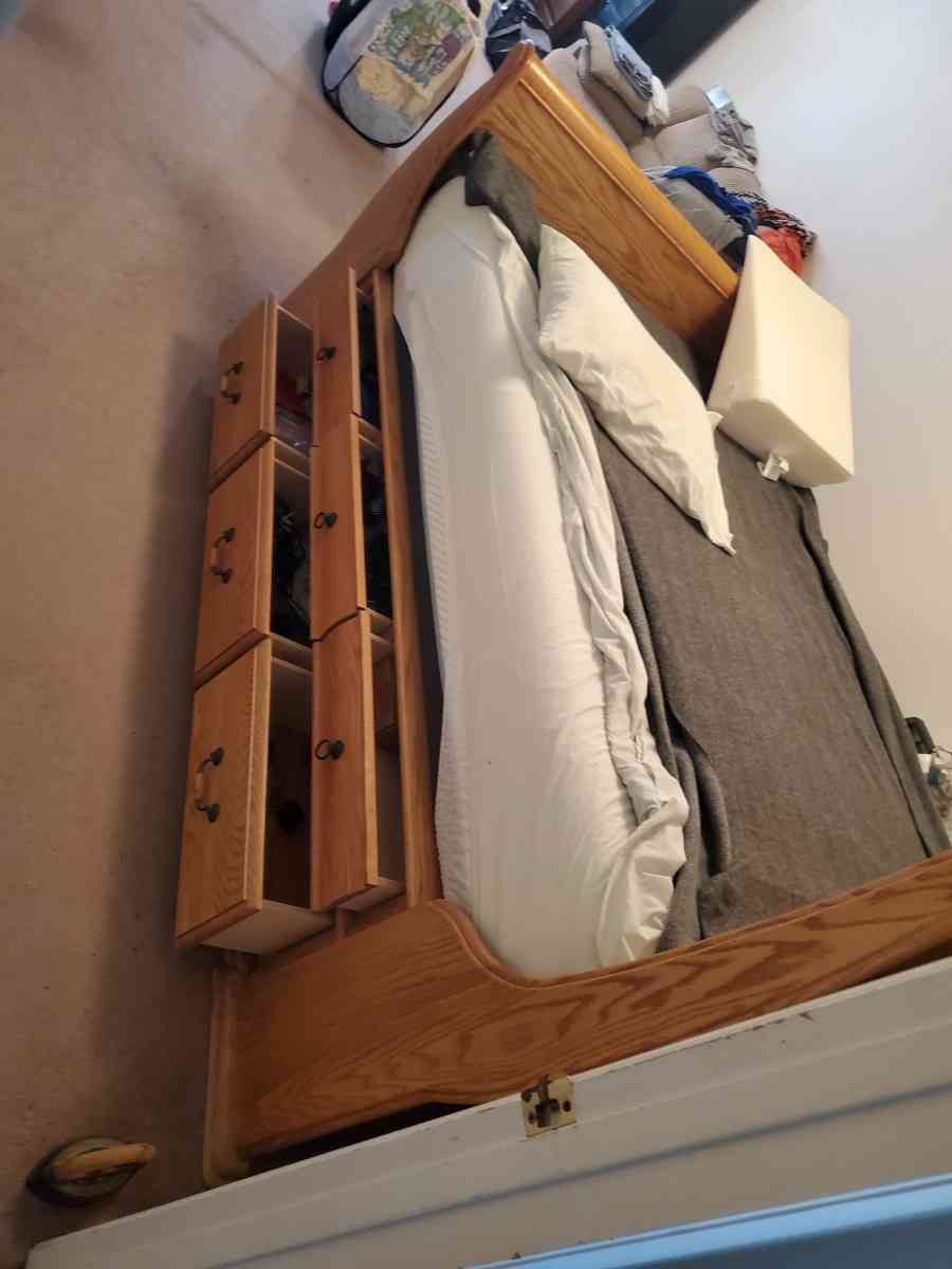 Solid oak queen sleigh platform bed with 12 drawers