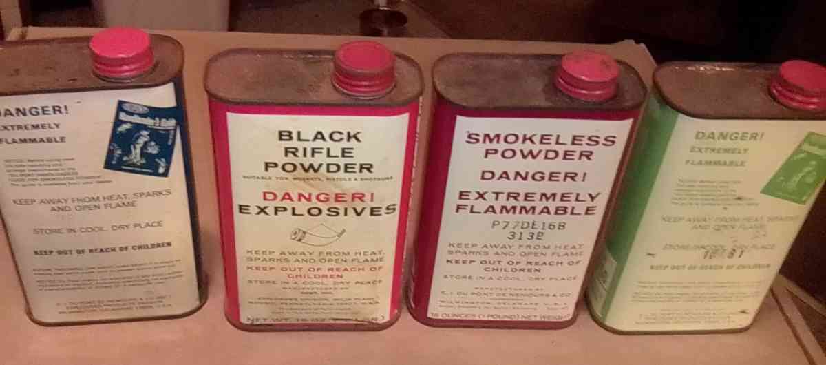 collection of gunpowder tins