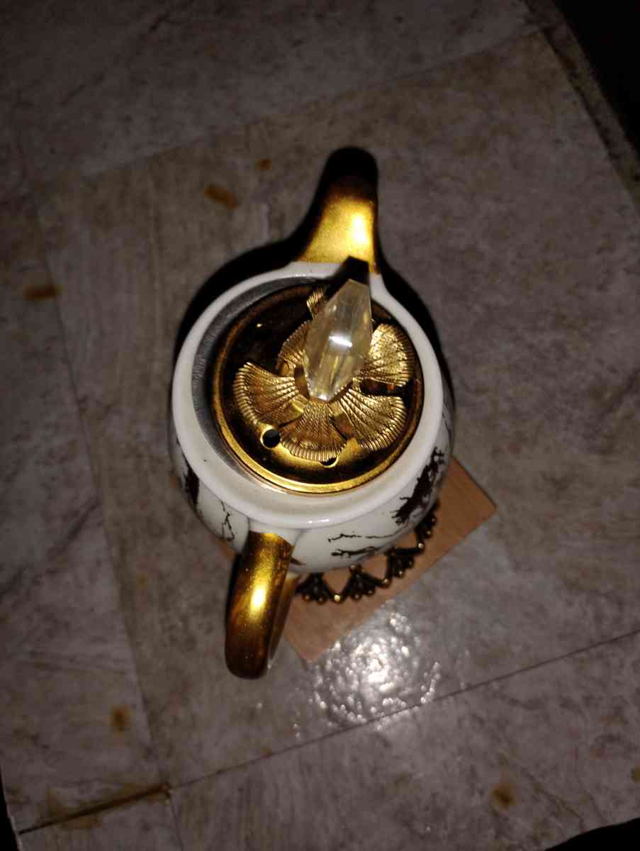 gold and white teacup