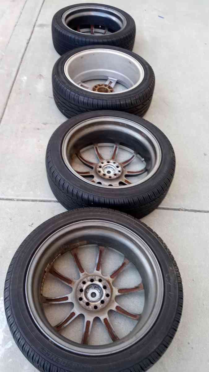 the set of 4 tires wheels R 18