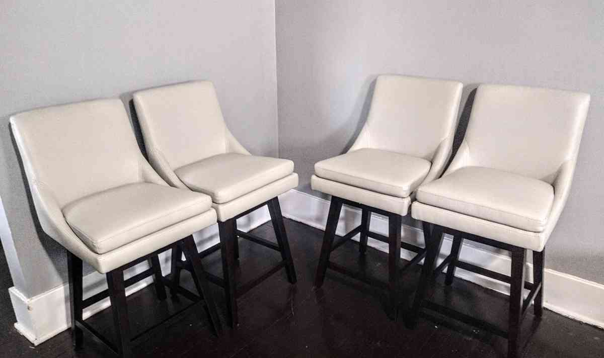 Lissa Light Gray Faux Leather Swivel Counter Stool Set Of 4