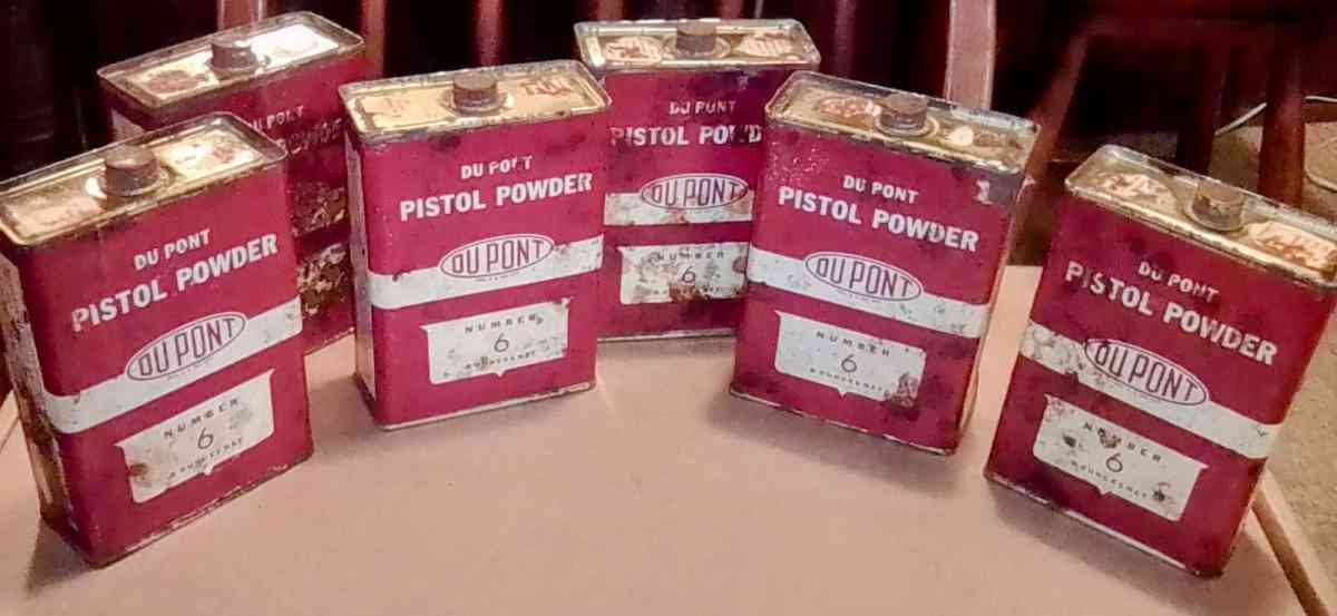 collection of gunpowder tins