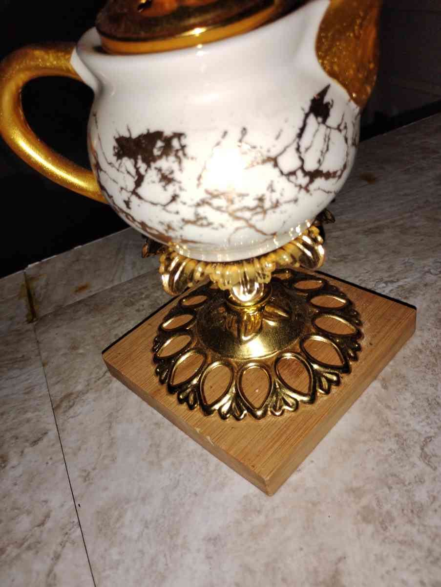 gold and white teacup