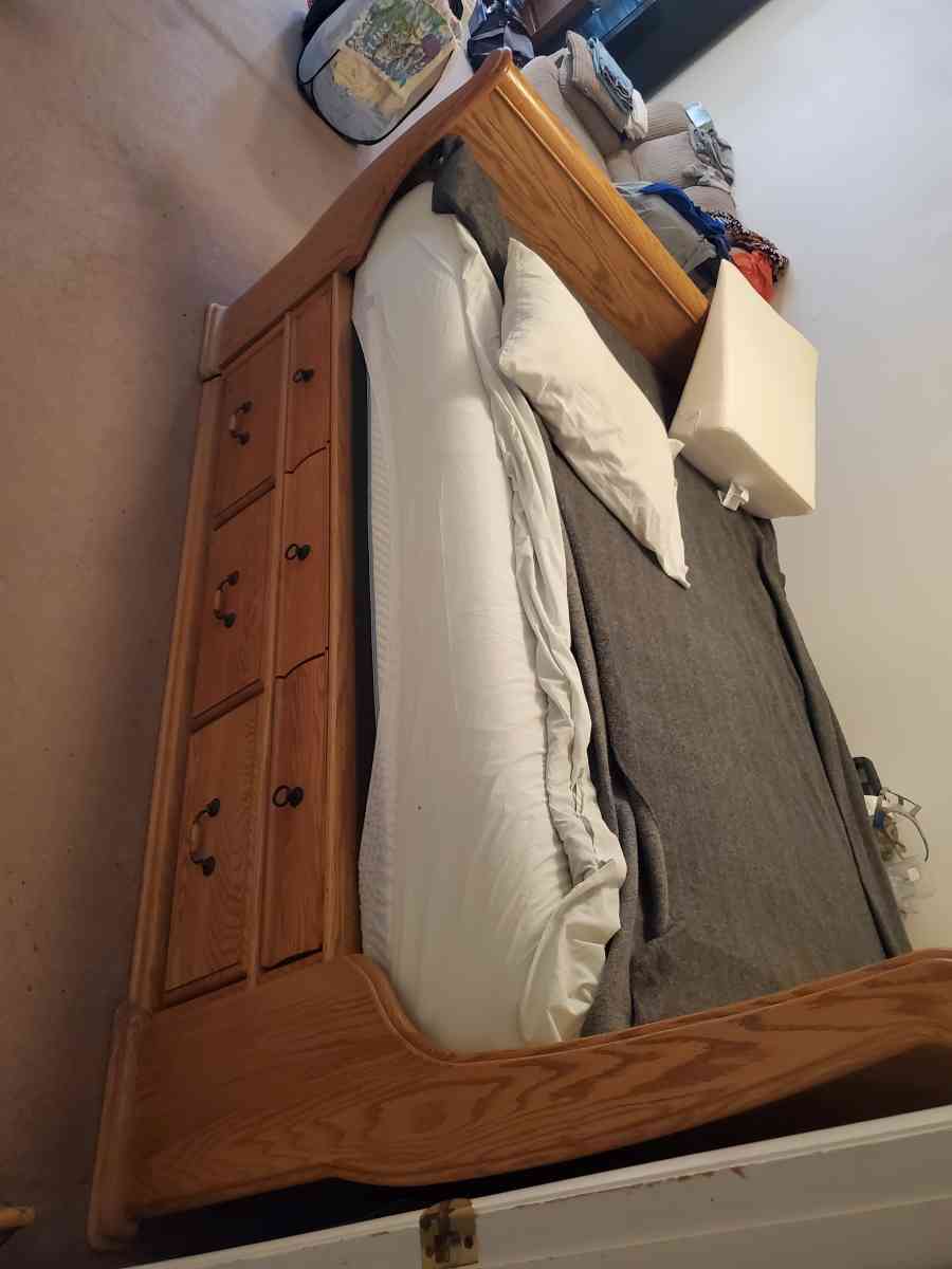Solid oak queen sleigh platform bed with 12 drawers