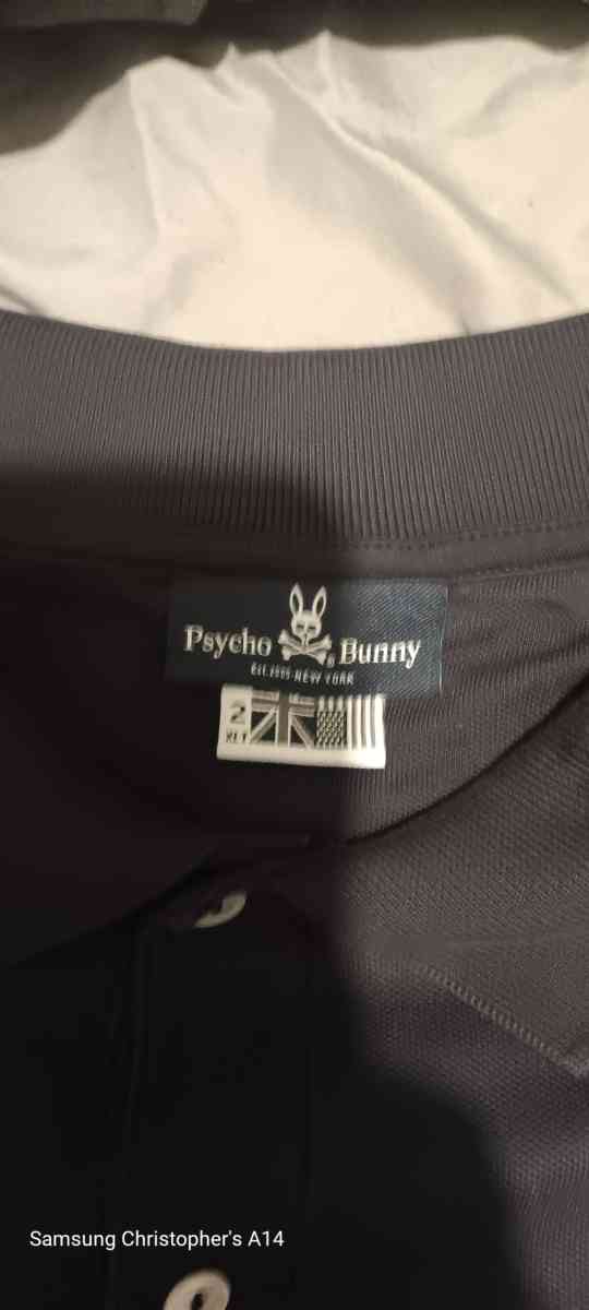 a 2x Pyscho Bunny Polo style dress shirt