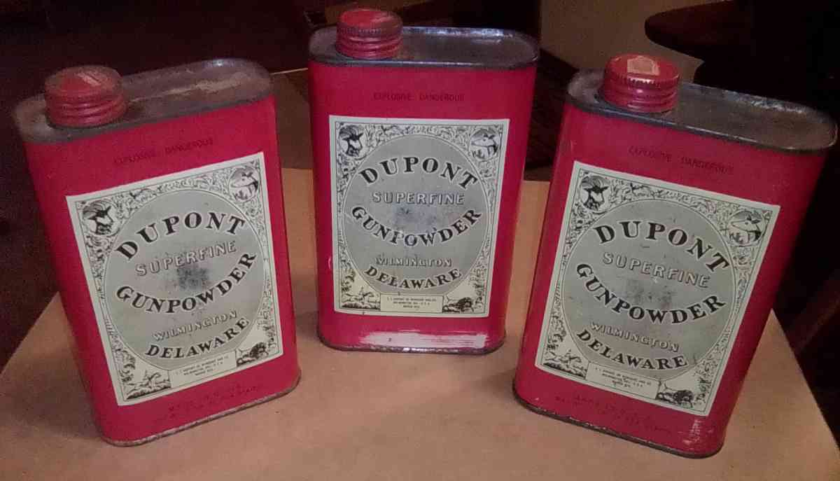 collection of gunpowder tins