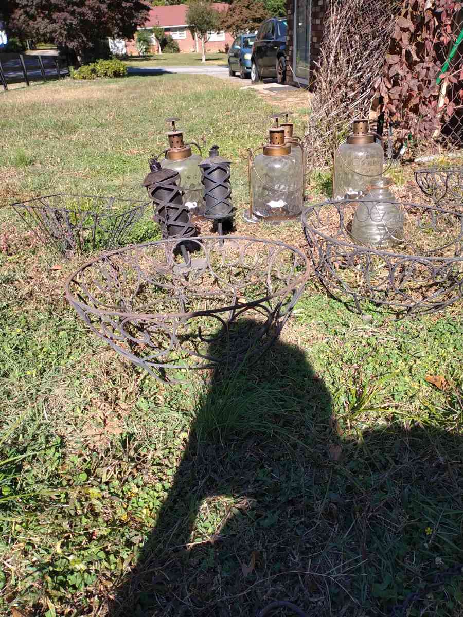 4 hanging plant holders  2 tiki torches  4 lanterns