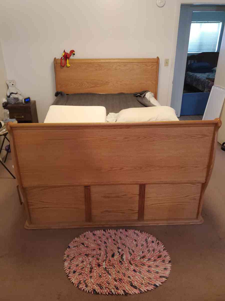 Solid oak queen sleigh platform bed with 12 drawers