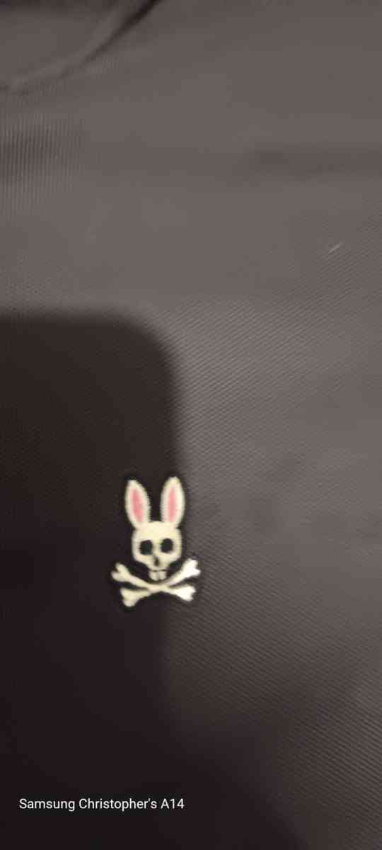 a 2x Pyscho Bunny Polo style dress shirt