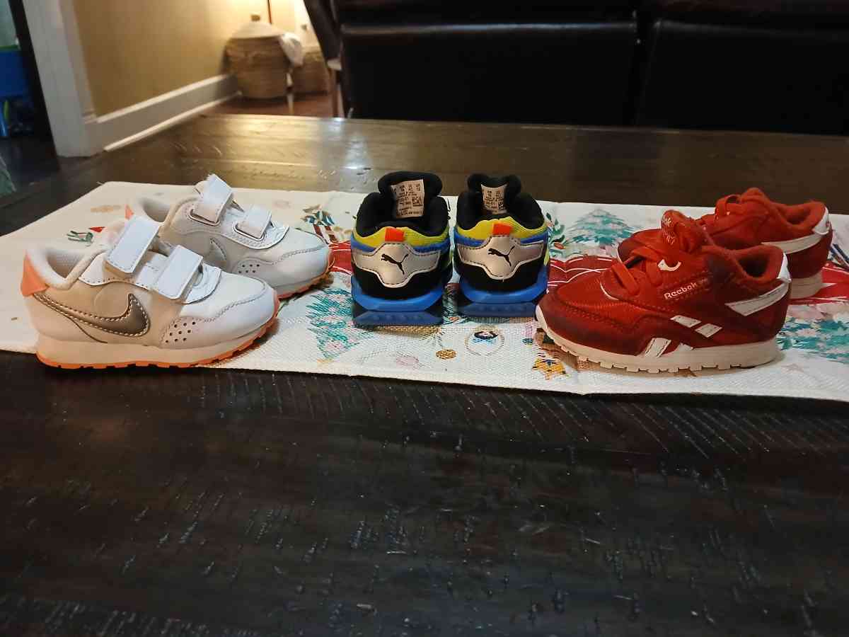 Lot of baby shoes Nike Reebok and Puma 4C