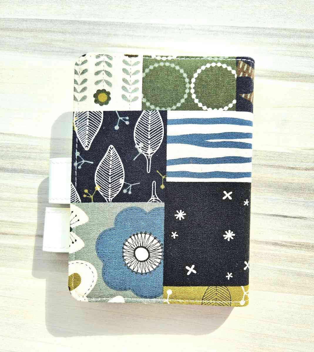 Item Small Fabric Covered Gridded Journals