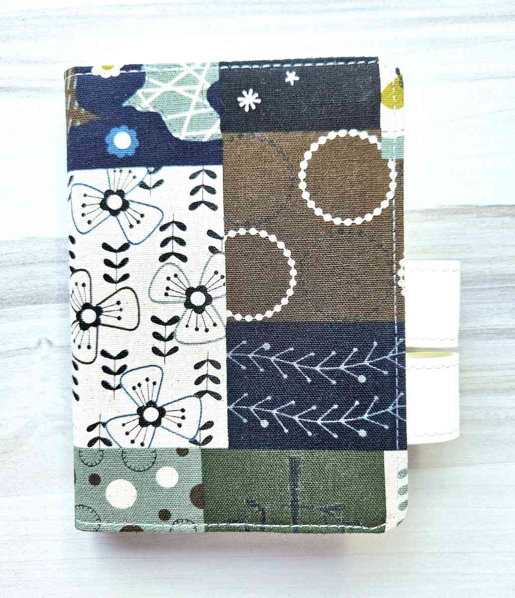 Item Small Fabric Covered Gridded Journals