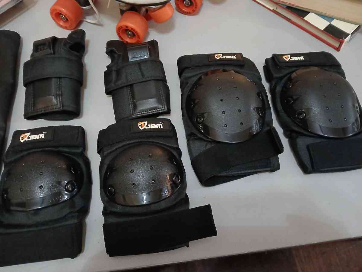 Roller Derby classic roller skates with pads and guards