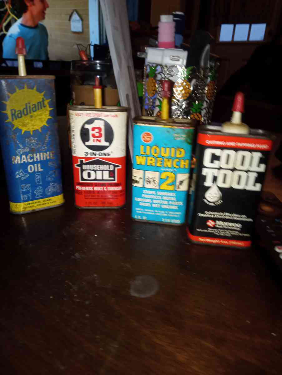 old oil and lube cans