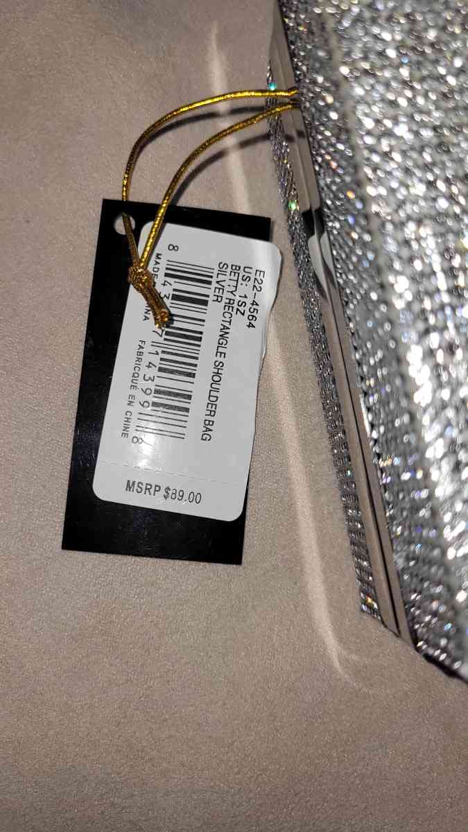 brand new with tags bebe clutch