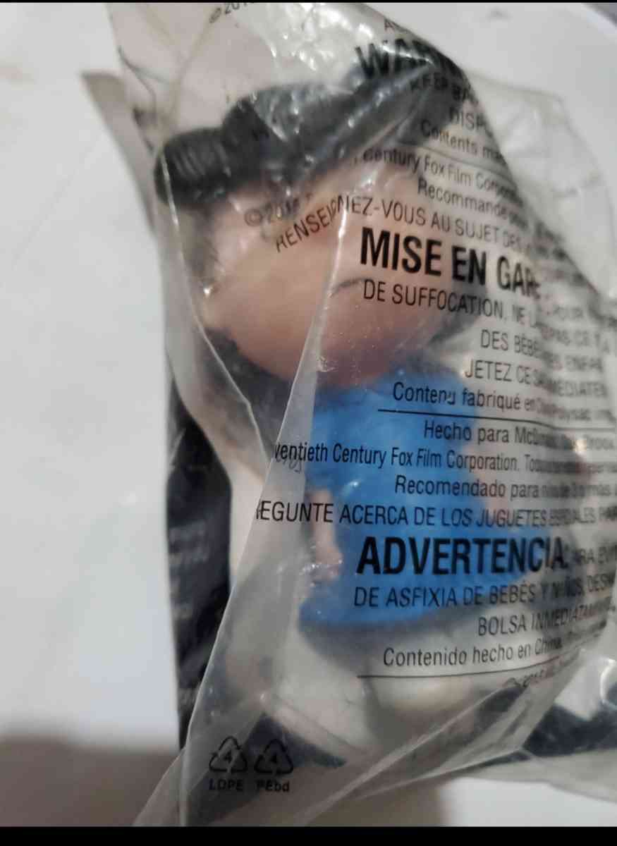 This McDonalds Happy Meal toy features Lucy from The Peanuts