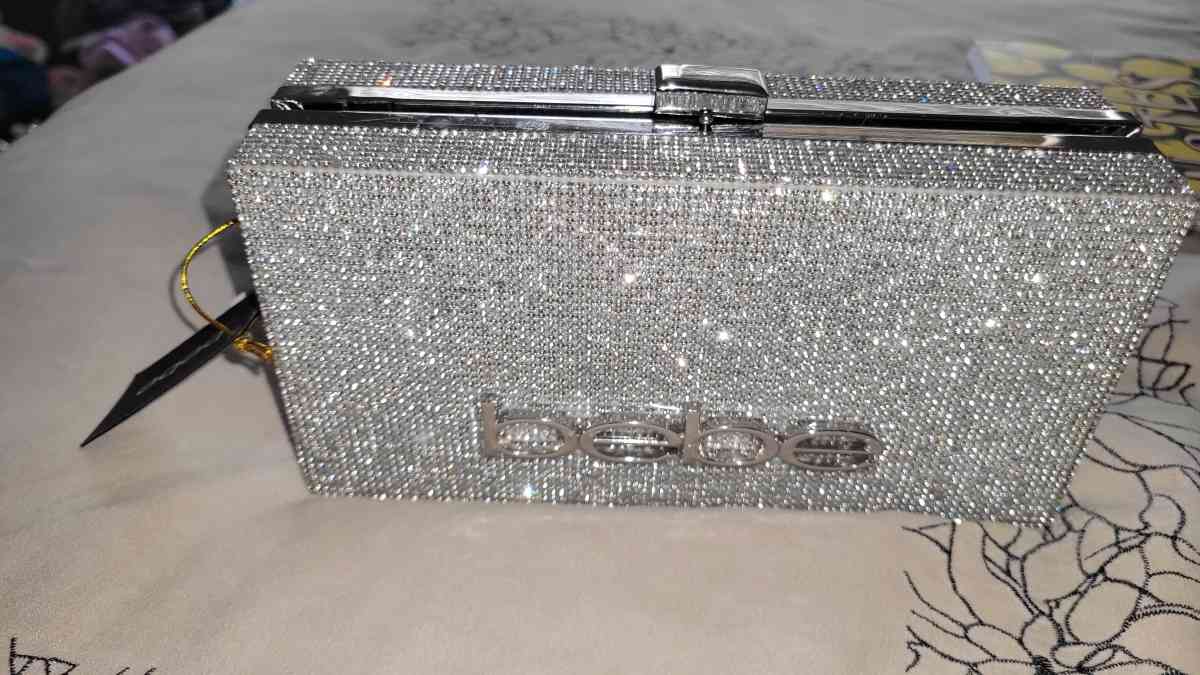 brand new with tags bebe clutch