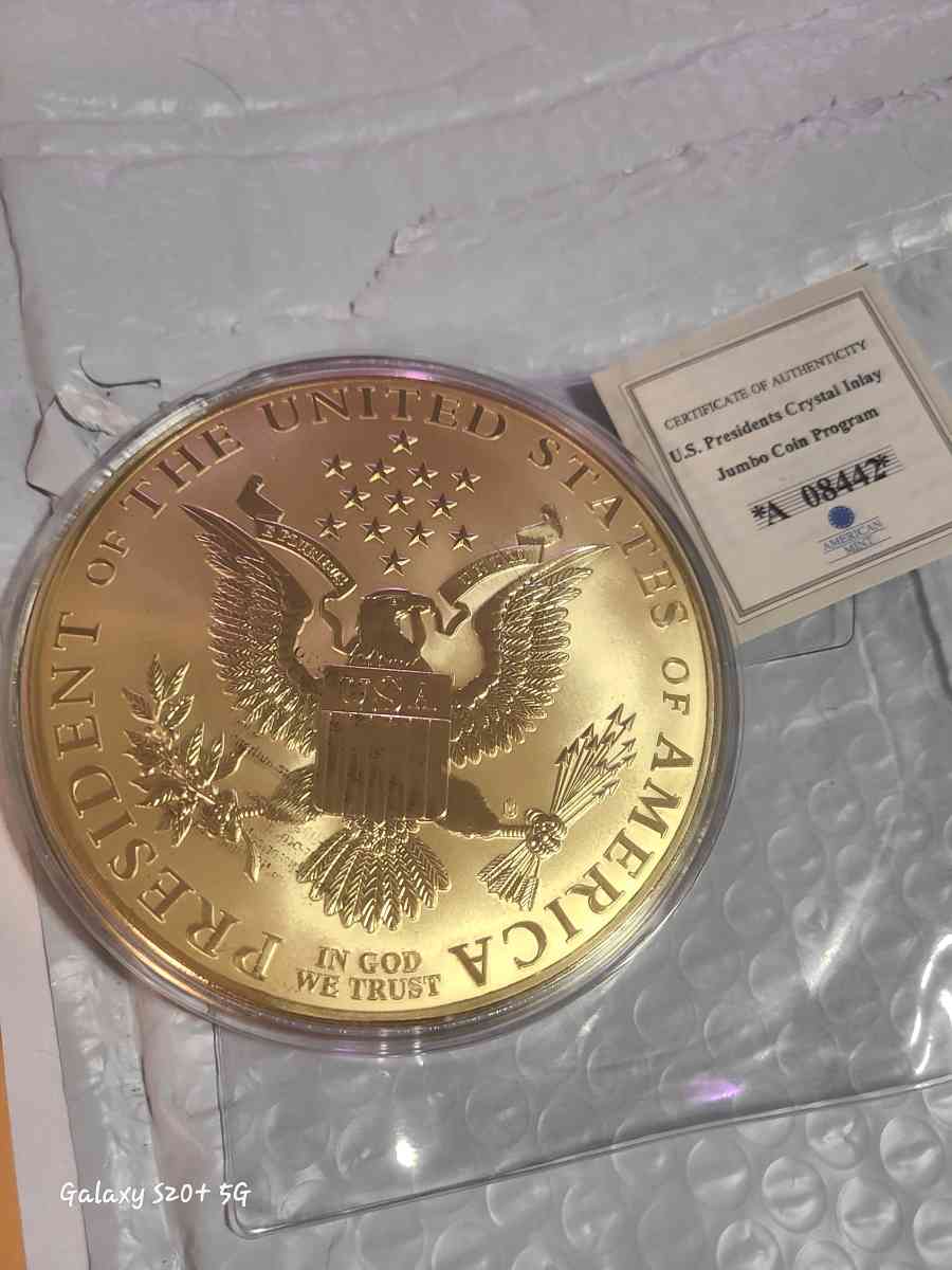 Donald trump jumbo coin layered in 24k gold