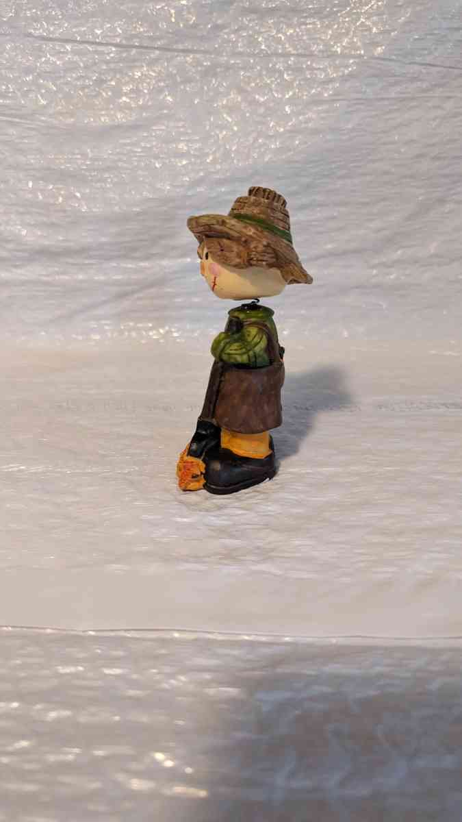 Resin Bobble Head Scarecrow Girl Raking Fall Leaves Figurine