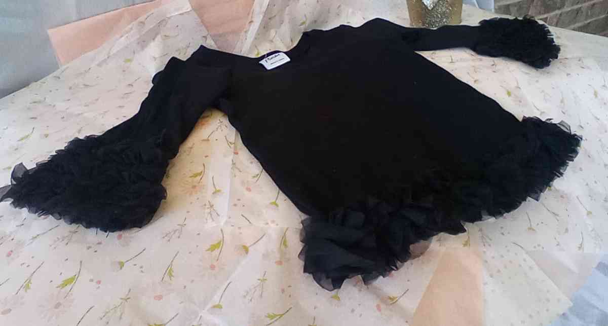 Girls Blk Ruffles on bottom and cuff of wrist