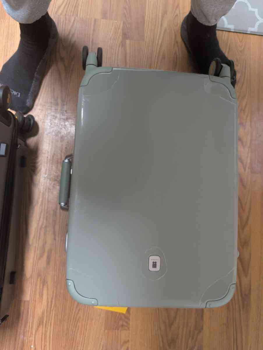 Two Level8 Carrying Suitcases