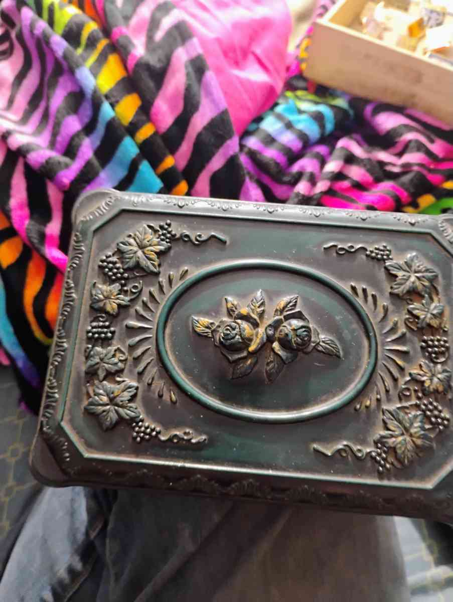 collection pins and vintage jewelry box