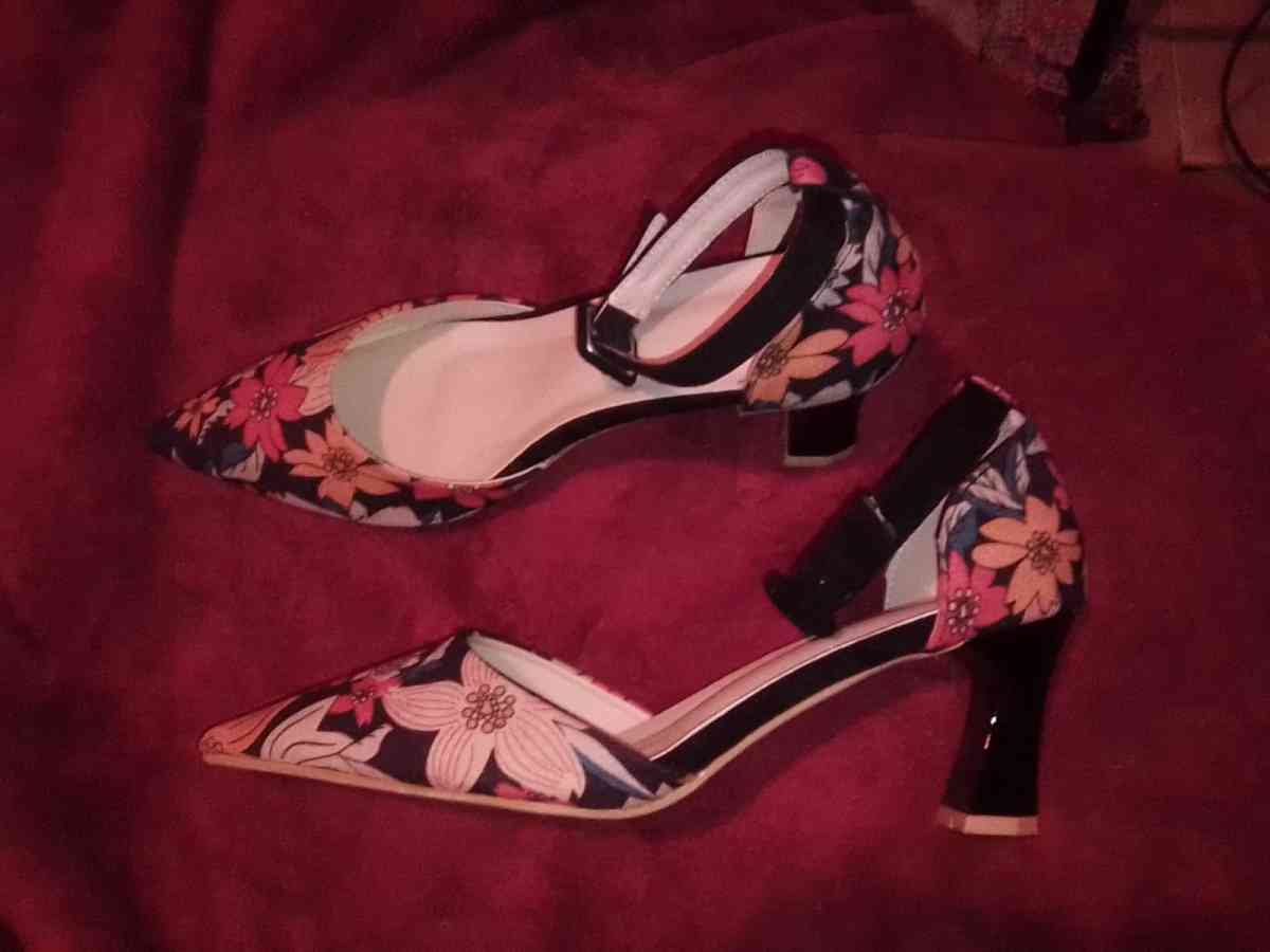 floral hells never worn