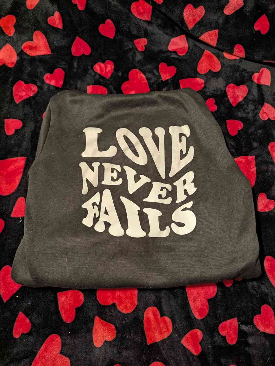 Love Never Fails Hoodie