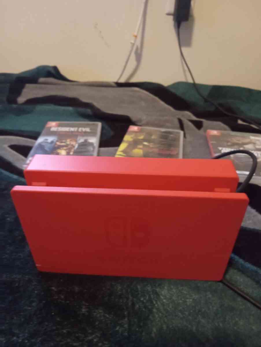 Nintendo switch with original box it came in 3 games
