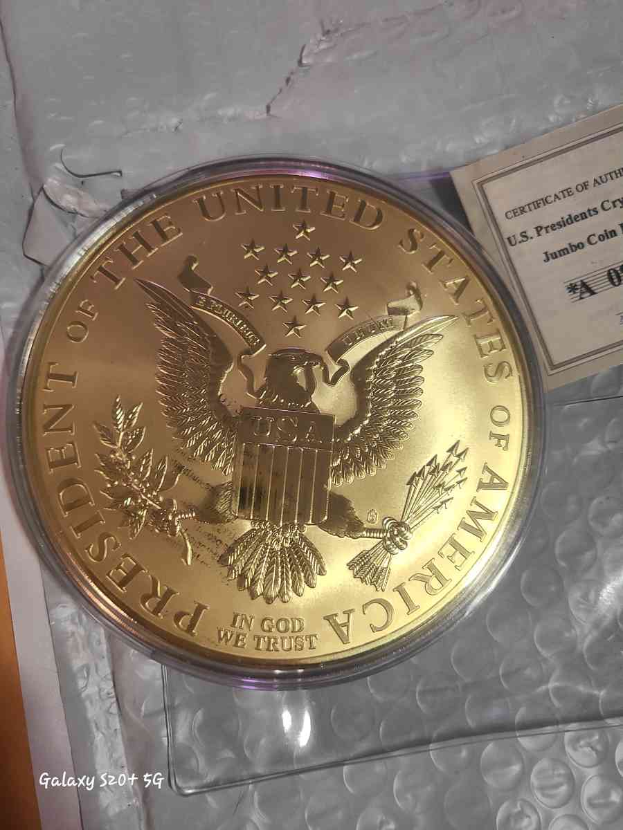 Donald trump jumbo coin layered in 24k gold