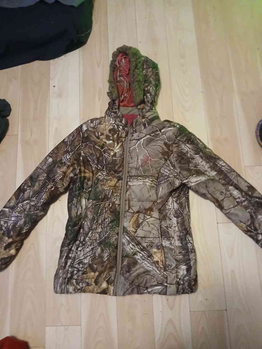 a pair of women boots size 6 and a womens medium jacket tree