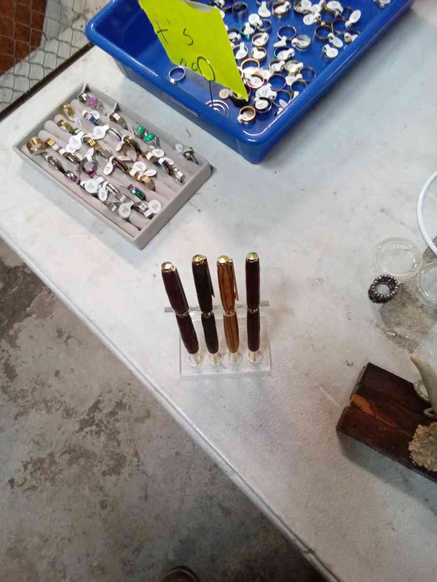 hand crafted pens and pencils of different  exotic  woods