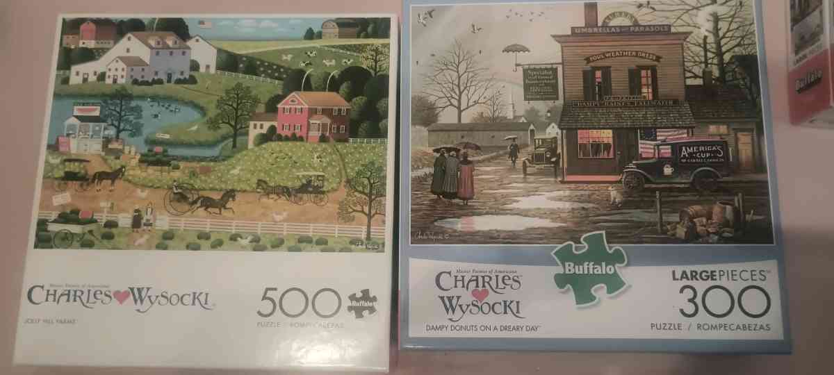 charles wysocki puzzles I have 20 of them all the pieces