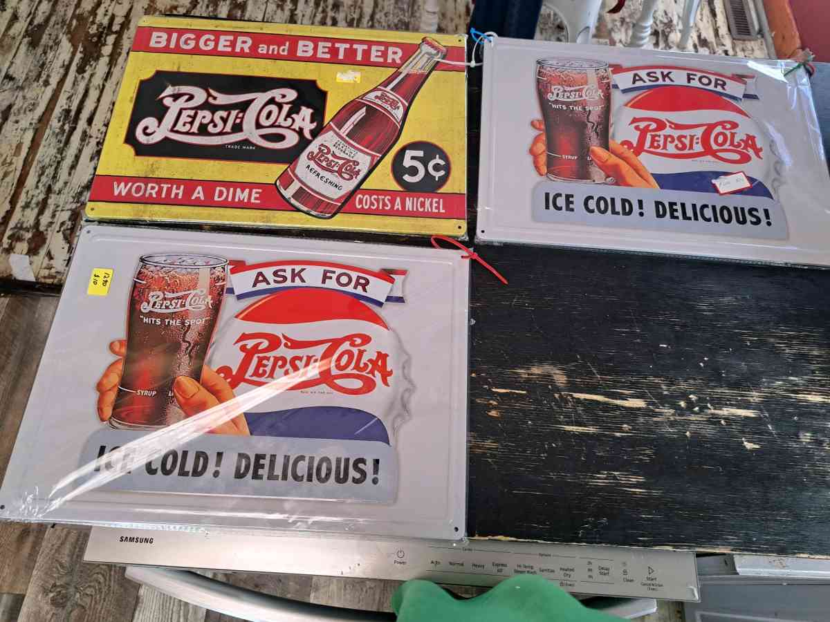 Pepsi tin signs