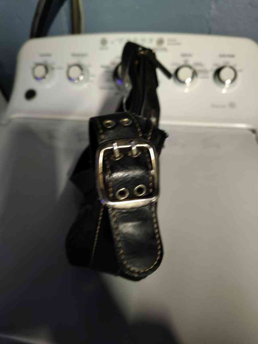 a black small purse Mine West