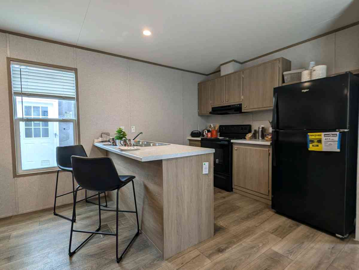 Singlewide Champion Home with 3 bedrooms and 2 bathrooms