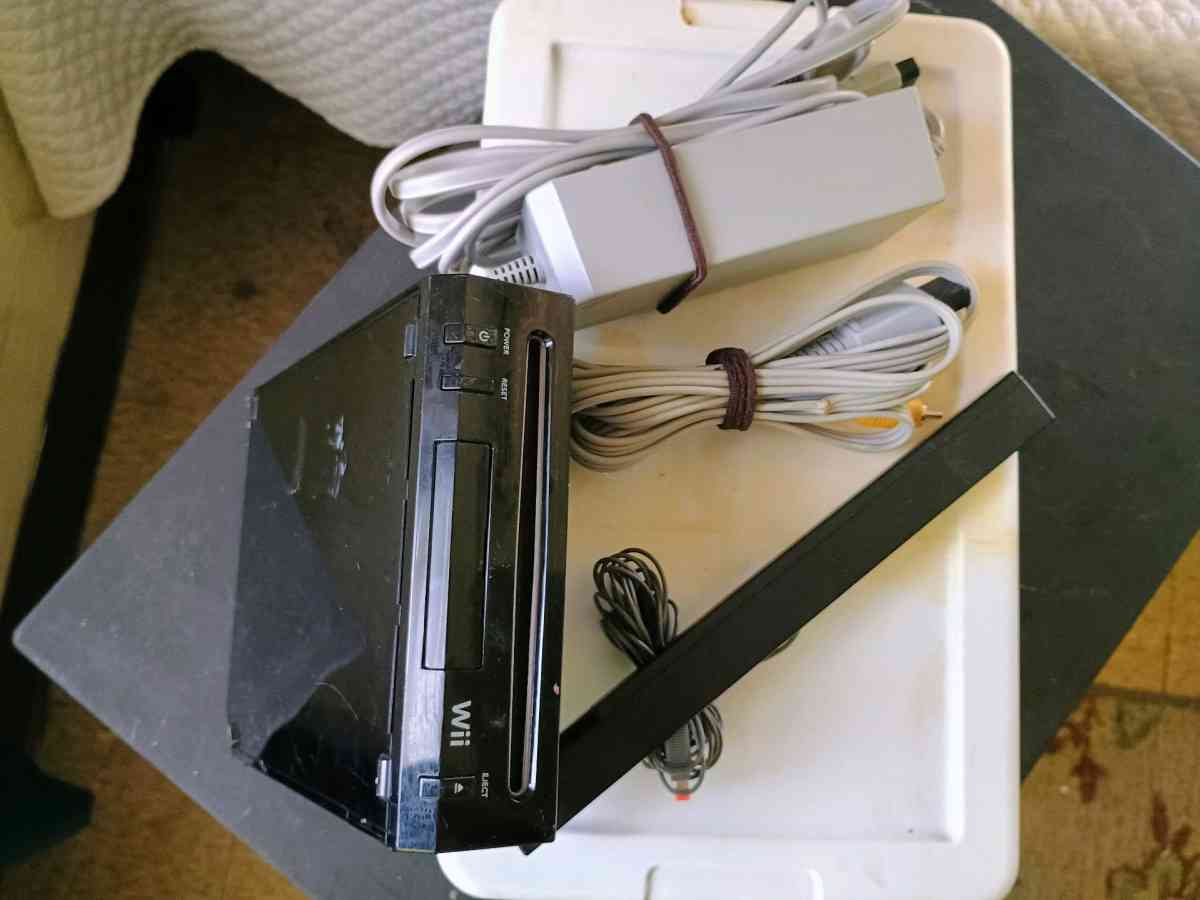 Nintendo WII w cords  and he sensor bar